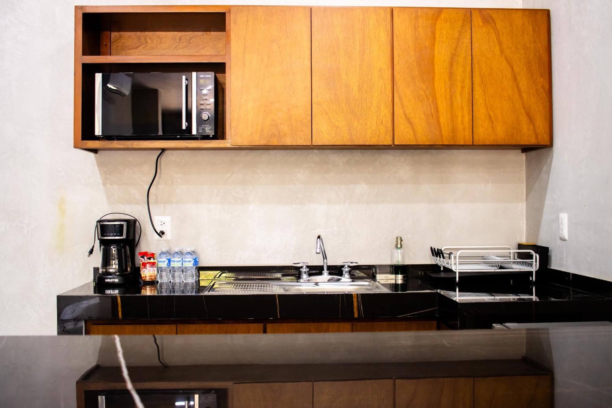 Hotel Casa Tortuga Tulum - Cenotes Park Inclusive Экстерьер фото A typical kitchenette