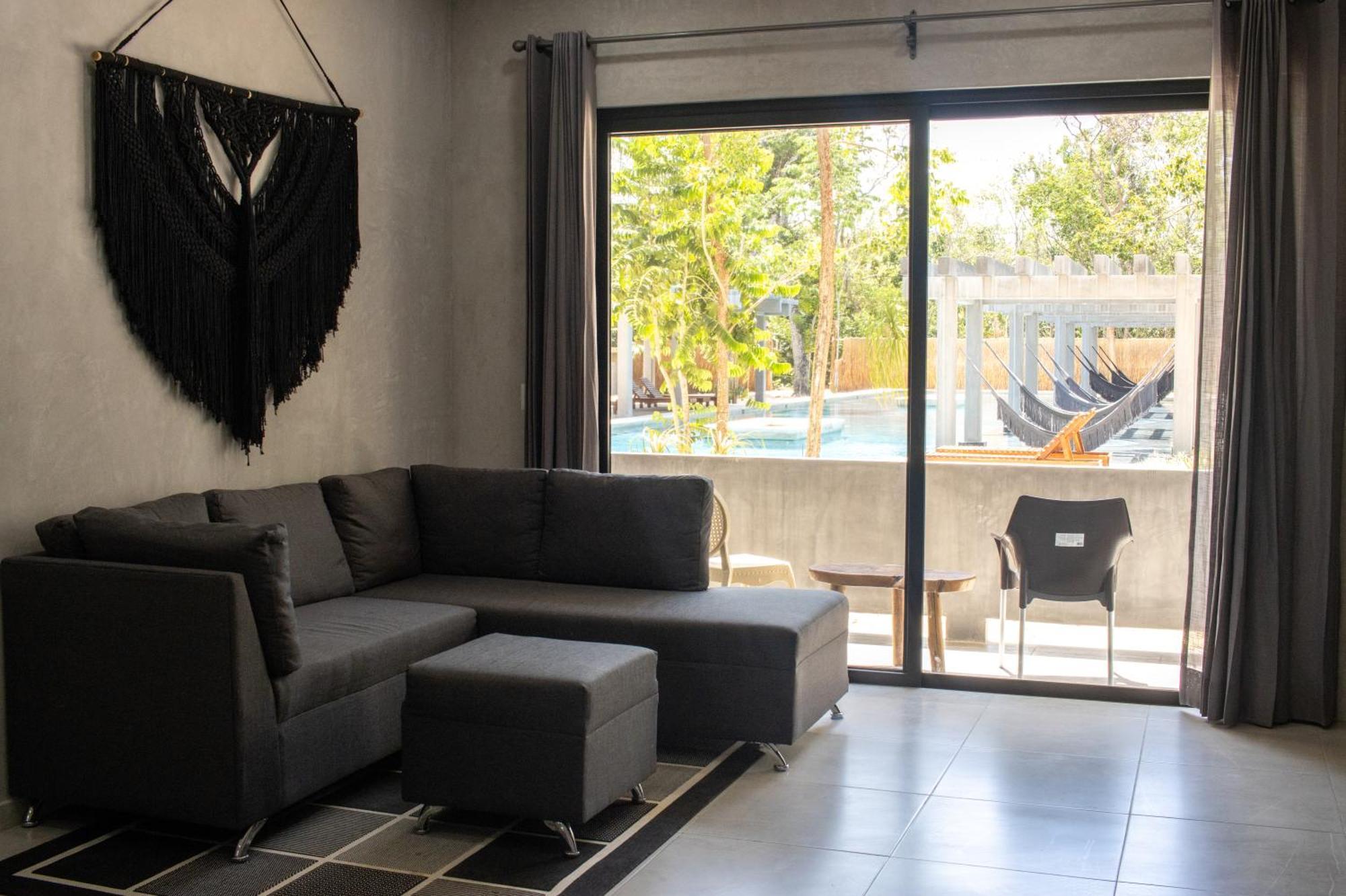 Hotel Casa Tortuga Tulum - Cenotes Park Inclusive Экстерьер фото A living room with a sofa
